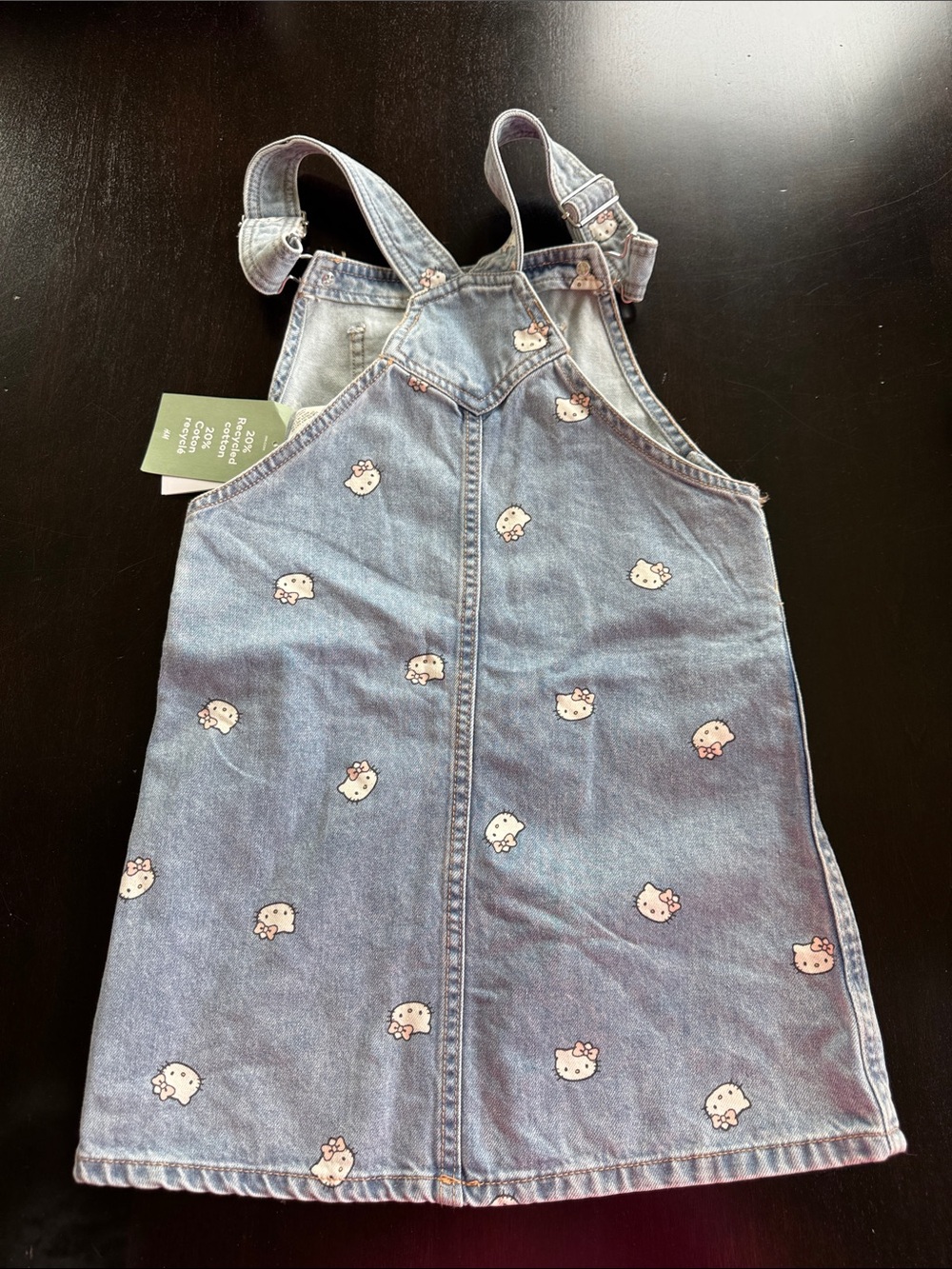 Hello Kitty Light Blue Denim Overall Dress with All-Over Kitty Faces - Picture 4 of 4